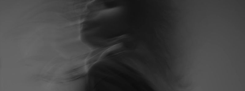 Abstract motion blur of a yoga sequence.